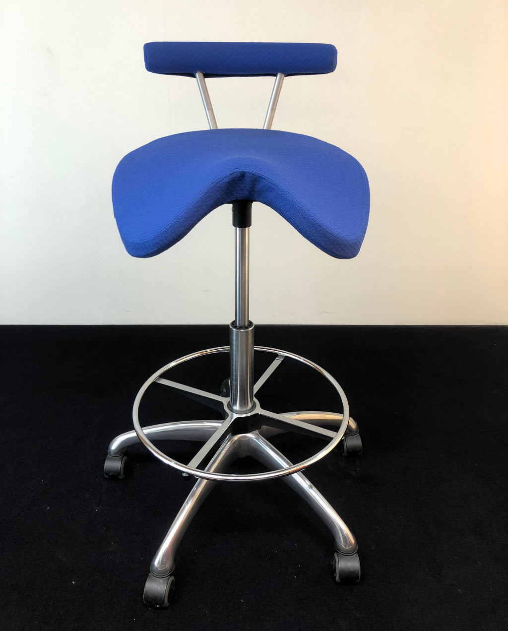 Sgabello "Balance" su ruote con pistone