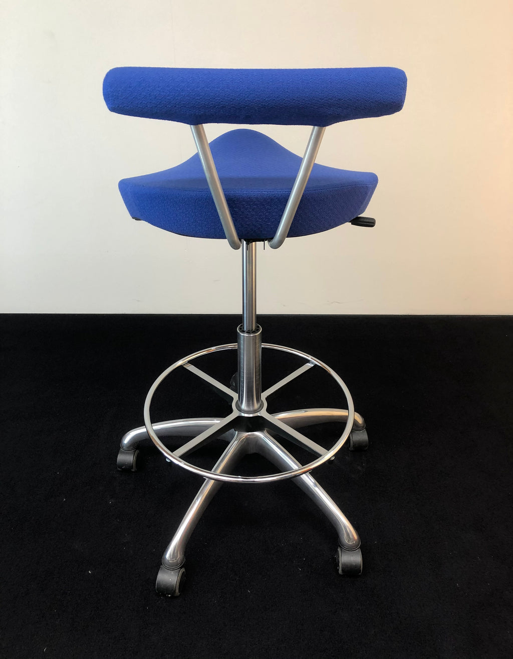 Sgabello "Balance" su ruote con pistone